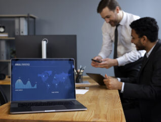 business-person-looking-finance-graphs (2)