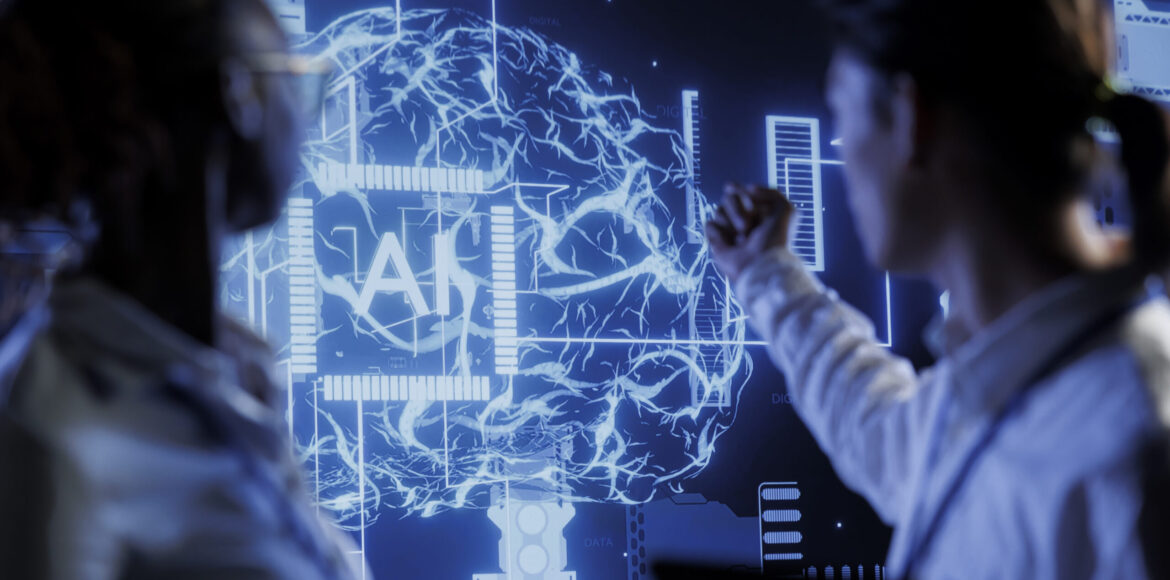 Engineers brainstorming ways to use AI Computer scientists brainstorm ways to use AI cognitive computing to extract usable information from complex data. Data center employees implement artificial intelligence to process massive datasets